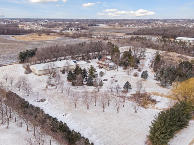 snowy aerial view featuring a rural view