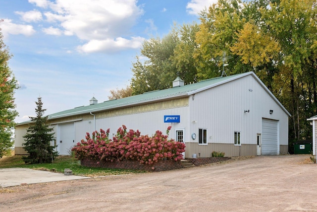 view of home's exterior with a garage