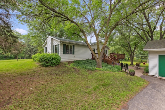 8685 79th St NW, Corinna Twp, MN 55302 - view of green lawn with a wooden deck, a patio, and stairs