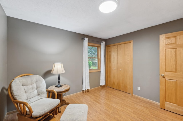 8685 79th St NW, Corinna Twp, MN 55302 - living area featuring light wood finished floors and baseboards