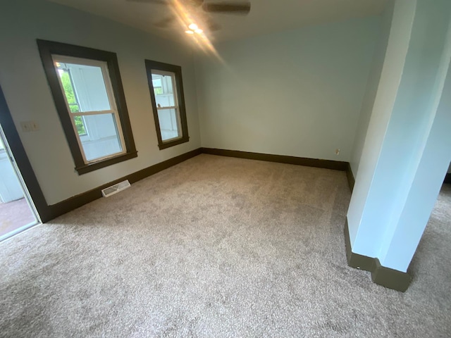 428 10th Ave N, Saint Cloud, MN 56303 - carpeted spare room featuring ceiling fan and baseboards