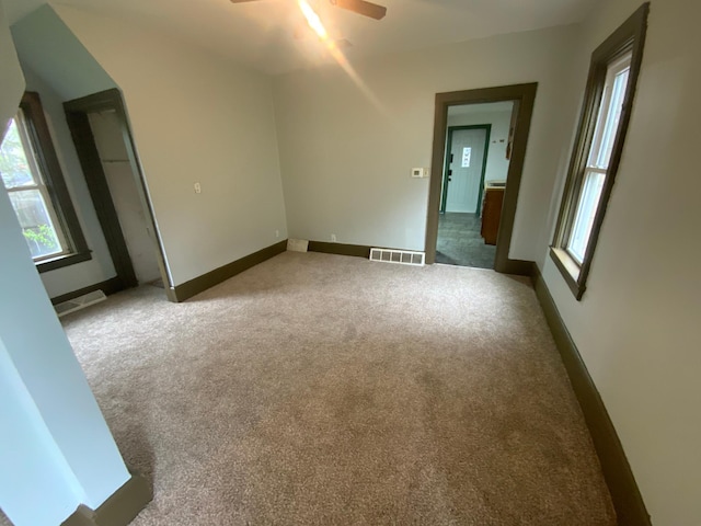 428 10th Ave N, Saint Cloud, MN 56303 - empty room with carpet floors, ceiling fan, and baseboards