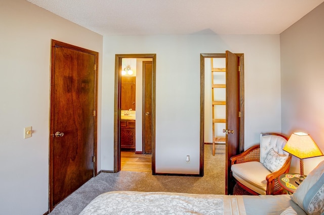 bedroom with baseboards and carpet floors