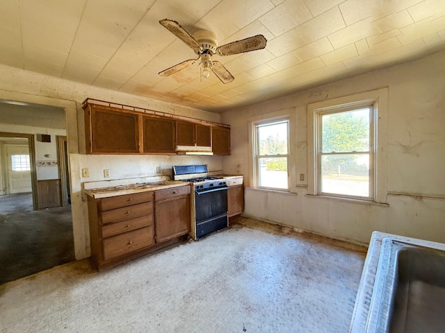 kitchen with ceiling fan and white gas stove