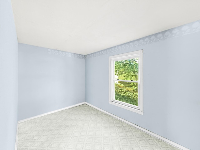 205 Adams St, Hutchinson, MN 55350 - spare room with baseboards