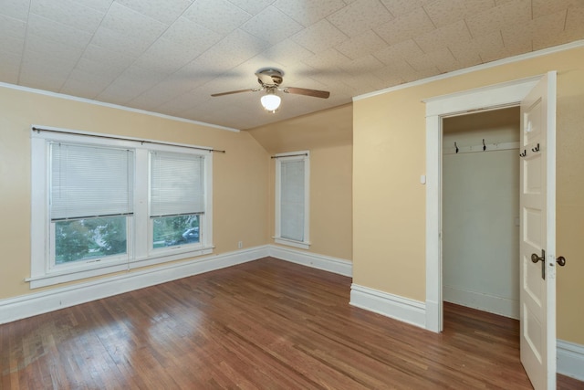 unfurnished bedroom featuring crown molding, ceiling fan, and wood-type flooring