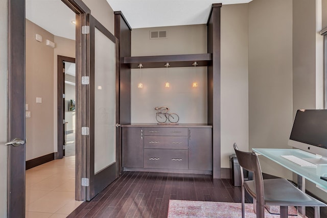 office space with french doors and dark hardwood / wood-style flooring