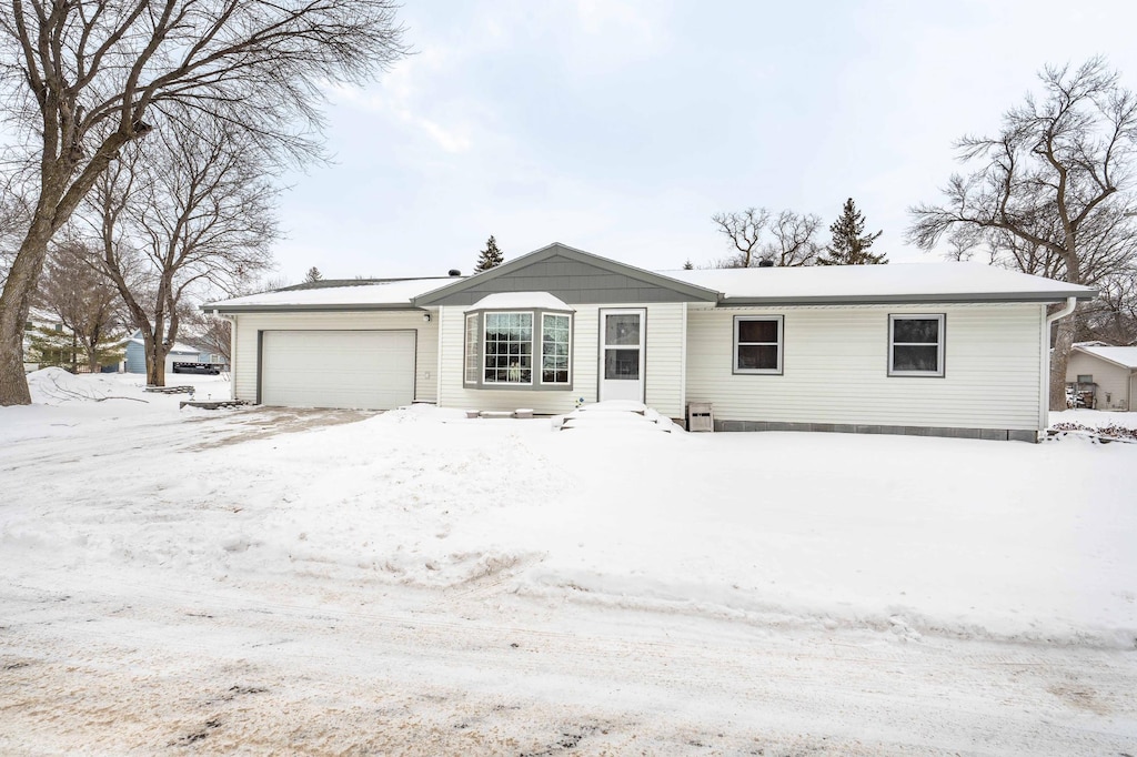 view of front of home with a garage