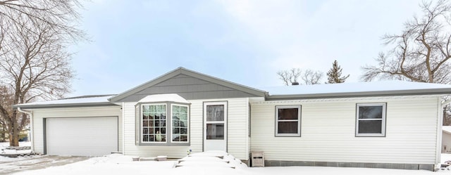 ranch-style home with a garage