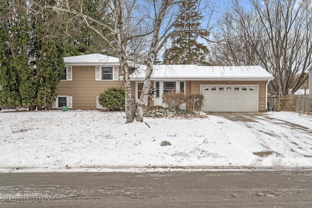 split level home with a garage