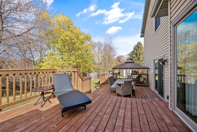 wooden deck with a gazebo