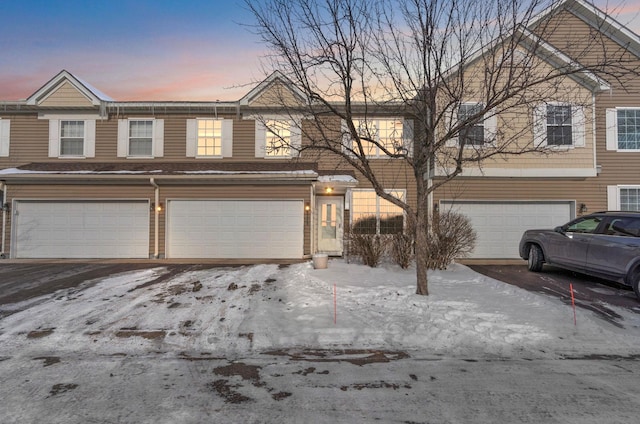 view of front of property with a garage