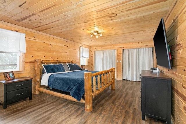 bedroom with multiple windows, dark wood-type flooring, and wood ceiling