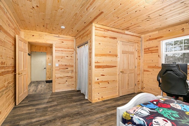 bedroom featuring wooden ceiling, dark hardwood / wood-style floors, and wood walls