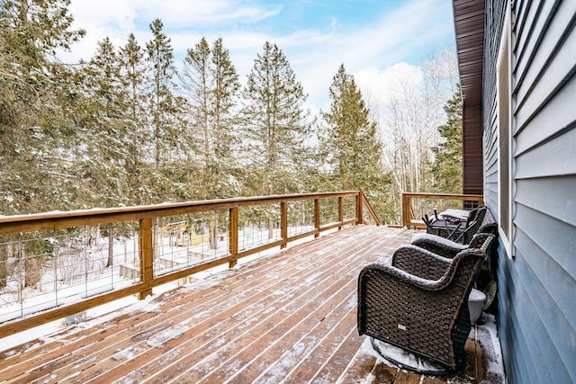 view of snow covered deck