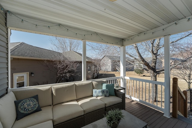 wooden deck featuring outdoor lounge area