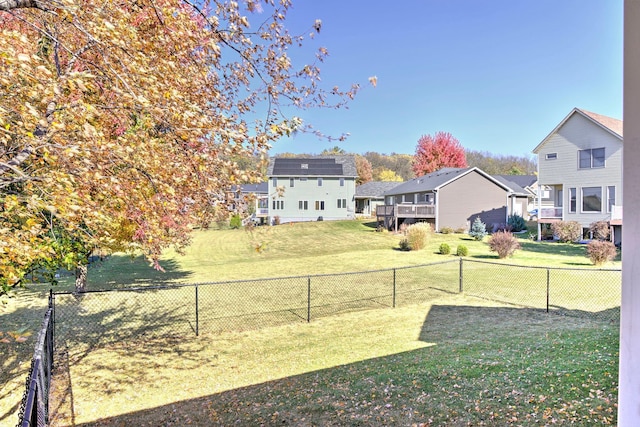 view of yard with a residential view and a fenced backyard