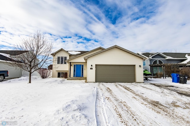 view of front of property with a garage