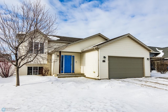 view of front of home with a garage