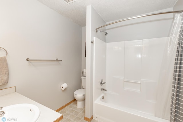 full bath with a textured ceiling, toilet, vanity, baseboards, and shower / tub combo with curtain