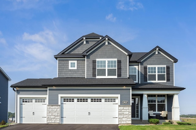 craftsman-style home with a garage