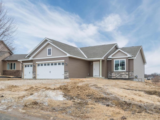 craftsman-style house featuring a garage