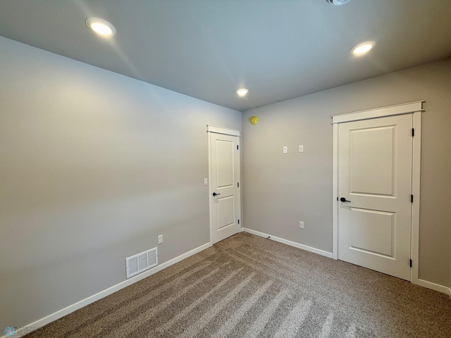 empty room featuring carpet