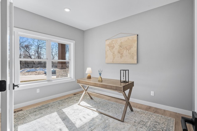 home office featuring light hardwood / wood-style flooring