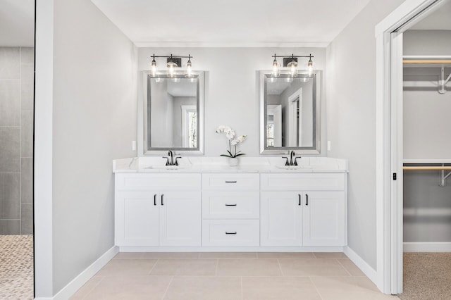 bathroom with vanity and tile patterned flooring