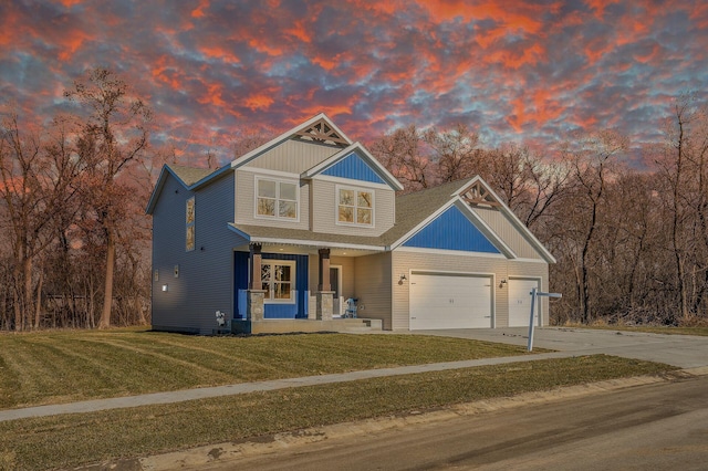 craftsman-style house featuring a yard and covered porch