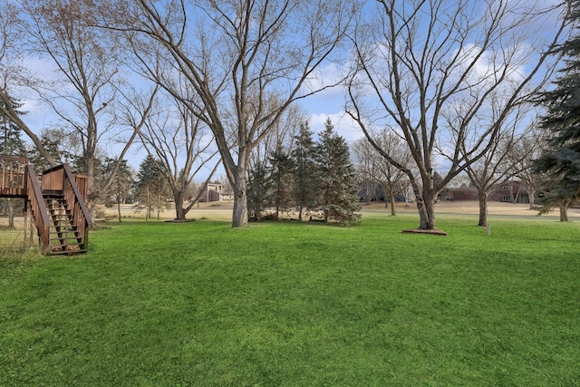 view of yard with a deck