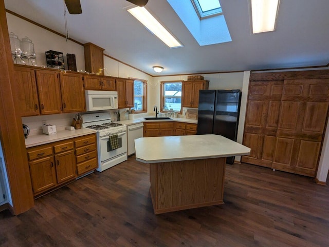 kitchen with lofted ceiling with skylight, a kitchen island, sink, dark wood-type flooring, and white appliances