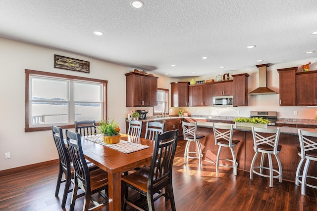 dining space featuring recessed lighting, baseboards, a textured ceiling, and dark wood-style floors