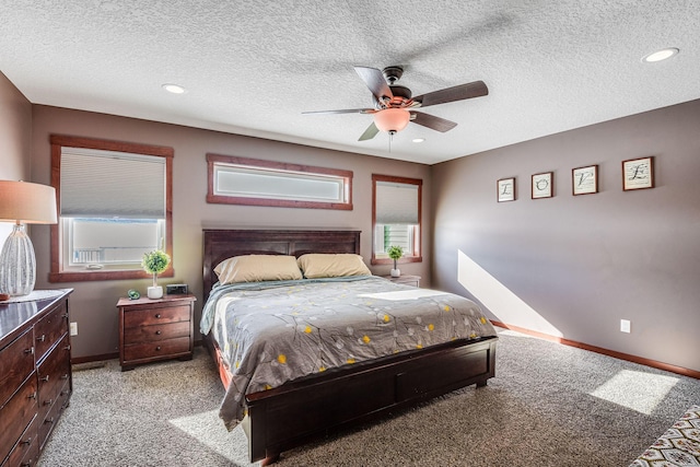 bedroom with recessed lighting, baseboards, a textured ceiling, and a ceiling fan