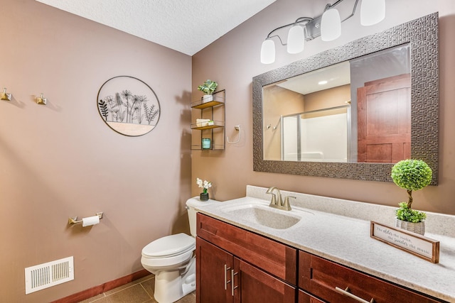 bathroom featuring visible vents, toilet, a shower stall, tile patterned flooring, and vanity