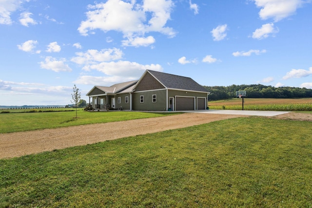 view of front facade with an attached garage, a front yard, and dirt driveway