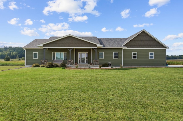 craftsman-style house with a front yard