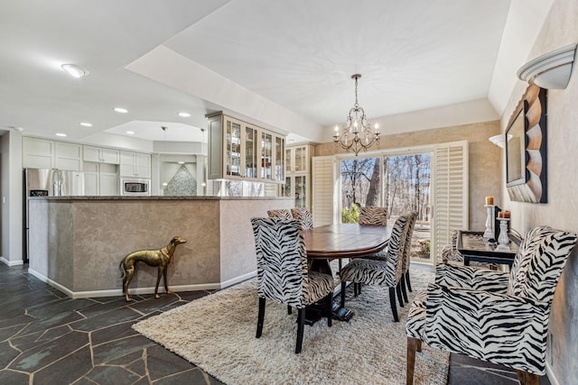 dining area with a chandelier