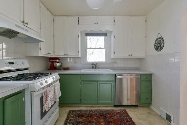 kitchen featuring white cabinetry, dishwasher, sink, green cabinets, and white range with gas stovetop