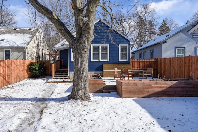 view of snow covered property