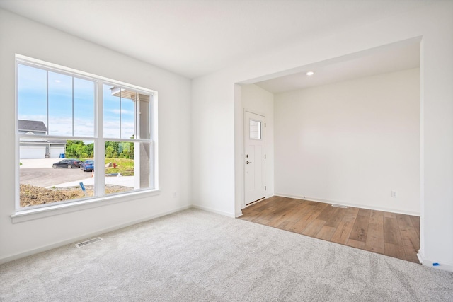 view of carpeted spare room