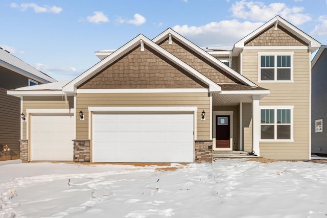 craftsman-style house featuring an attached garage