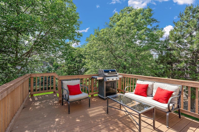 wooden terrace featuring an outdoor hangout area and grilling area