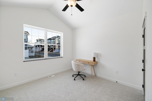 office featuring a ceiling fan, visible vents, carpet floors, lofted ceiling, and baseboards