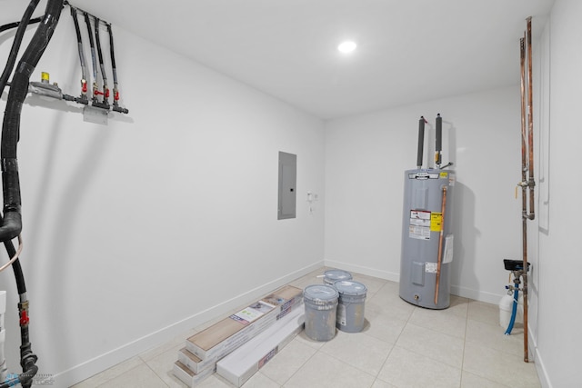 utility room featuring electric panel and water heater