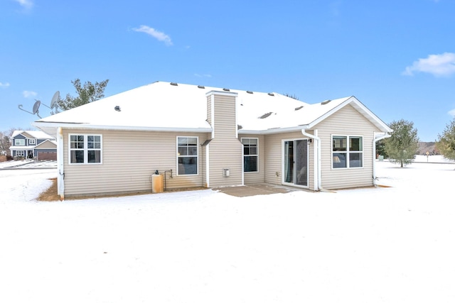 view of snow covered property