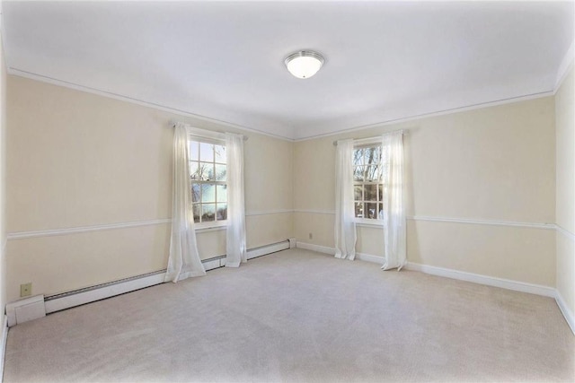 carpeted spare room with a wealth of natural light and ornamental molding