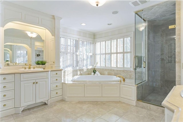 bathroom featuring independent shower and bath, crown molding, and vanity