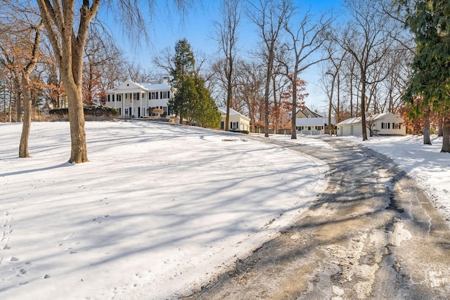 view of yard layered in snow