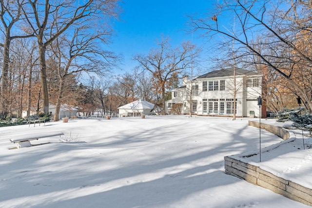 view of snowy yard